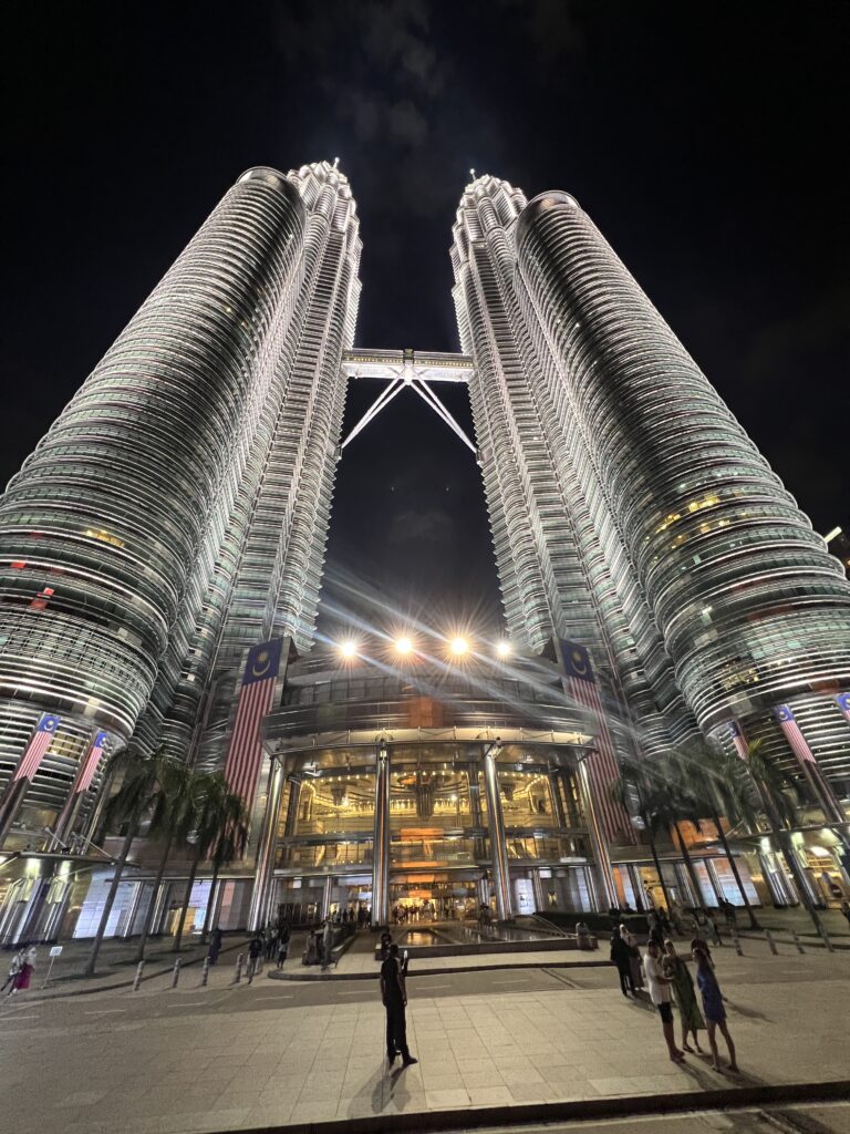 Exploring Petronas Tower at night with beautiful lights in my Kuala Lumpur 2-Day Itinerary